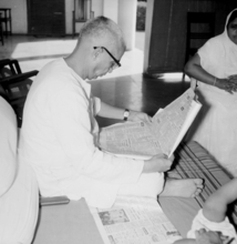 CCS reading the newspaper at his Mall Road Avenue residence, 1967