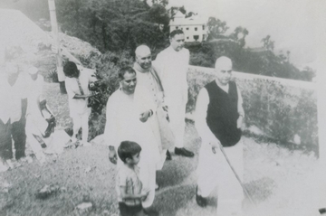 CCS with associates at his residence, date unknown, 1970